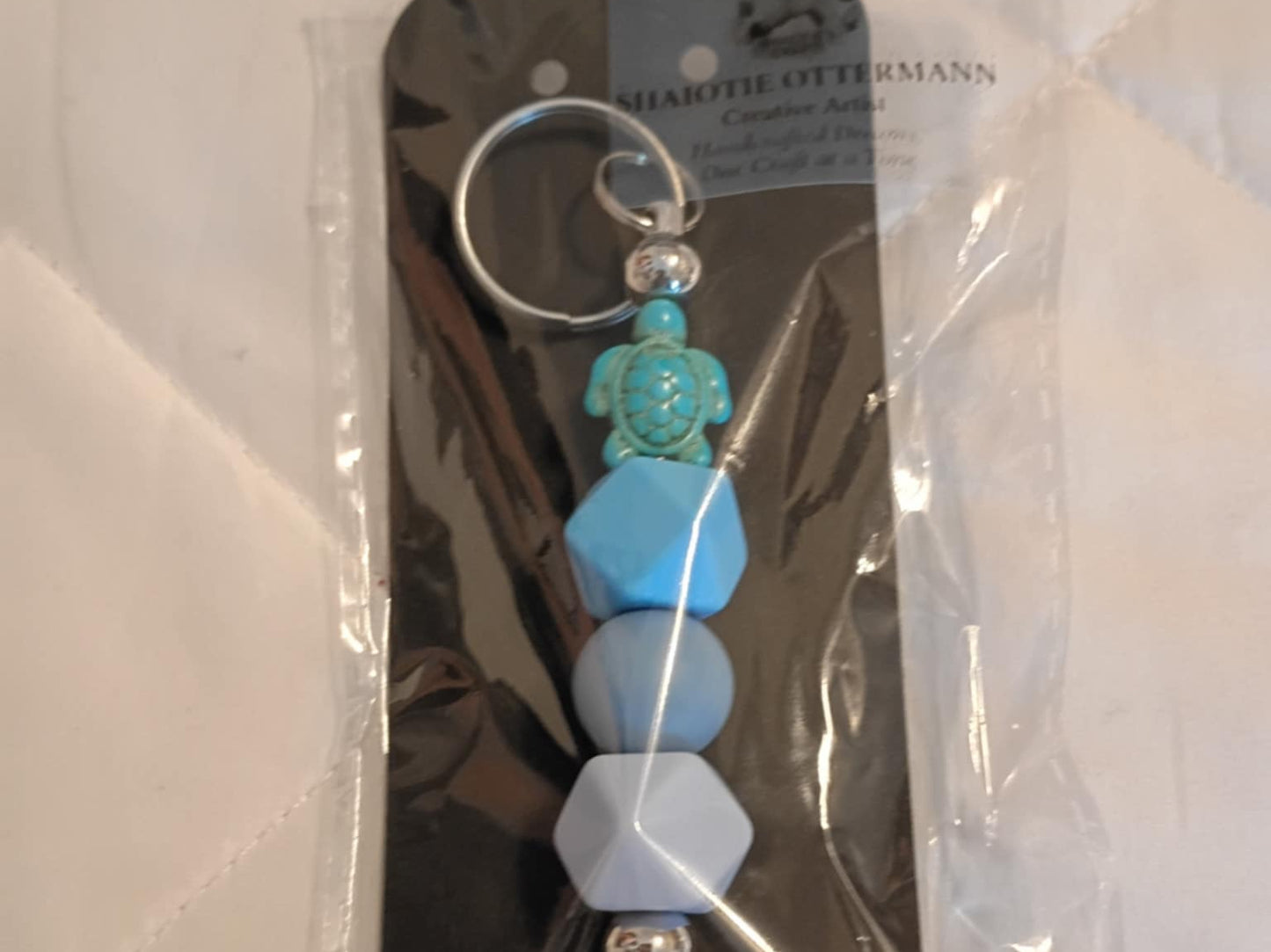 Handmade beaded keychain made by Shaiotie's Crafts aka Shaiotie Ottermann.